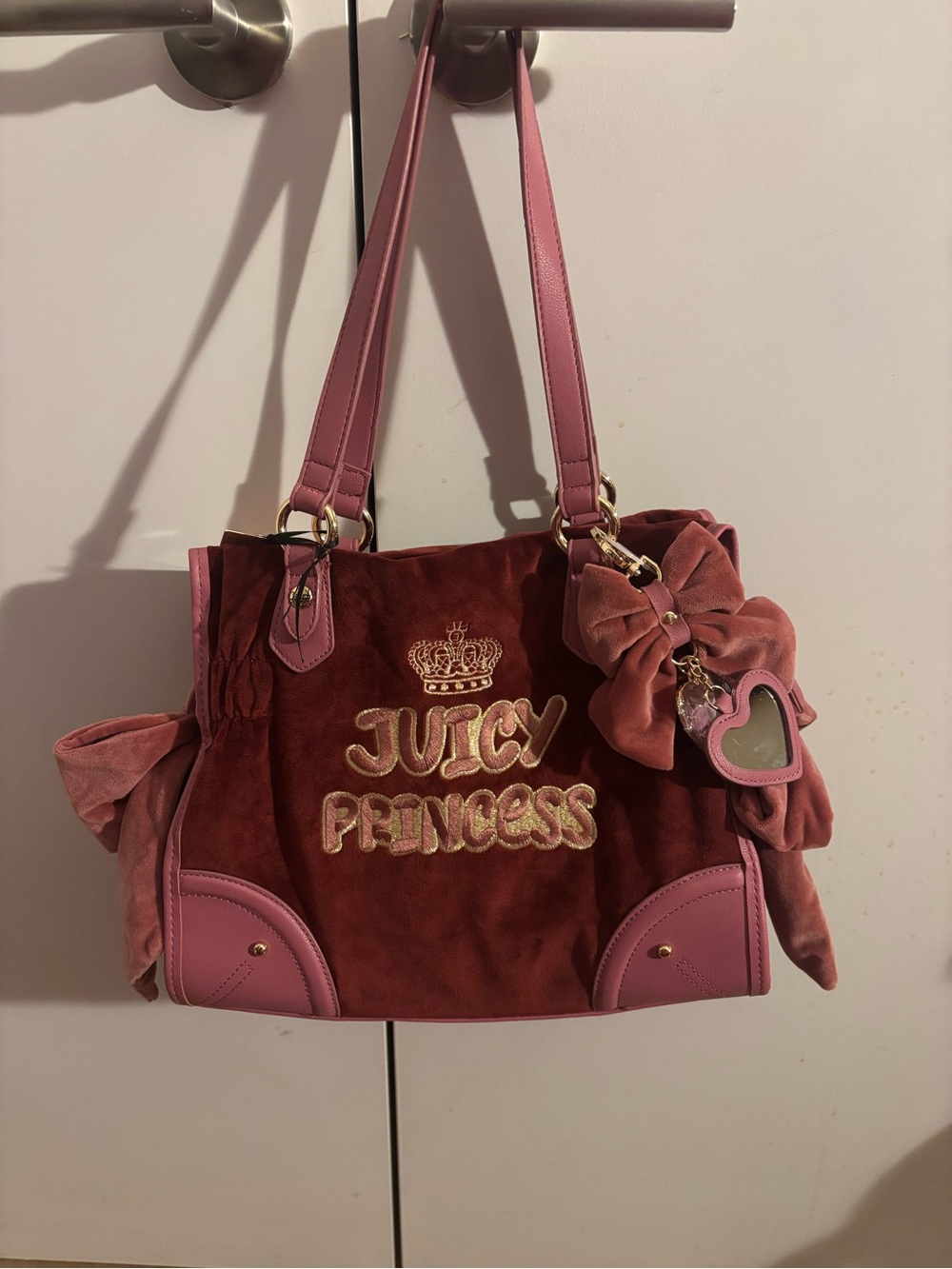 Juicy couture American princess tote in the color cranberry juice